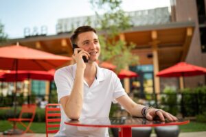 young man talking on phone